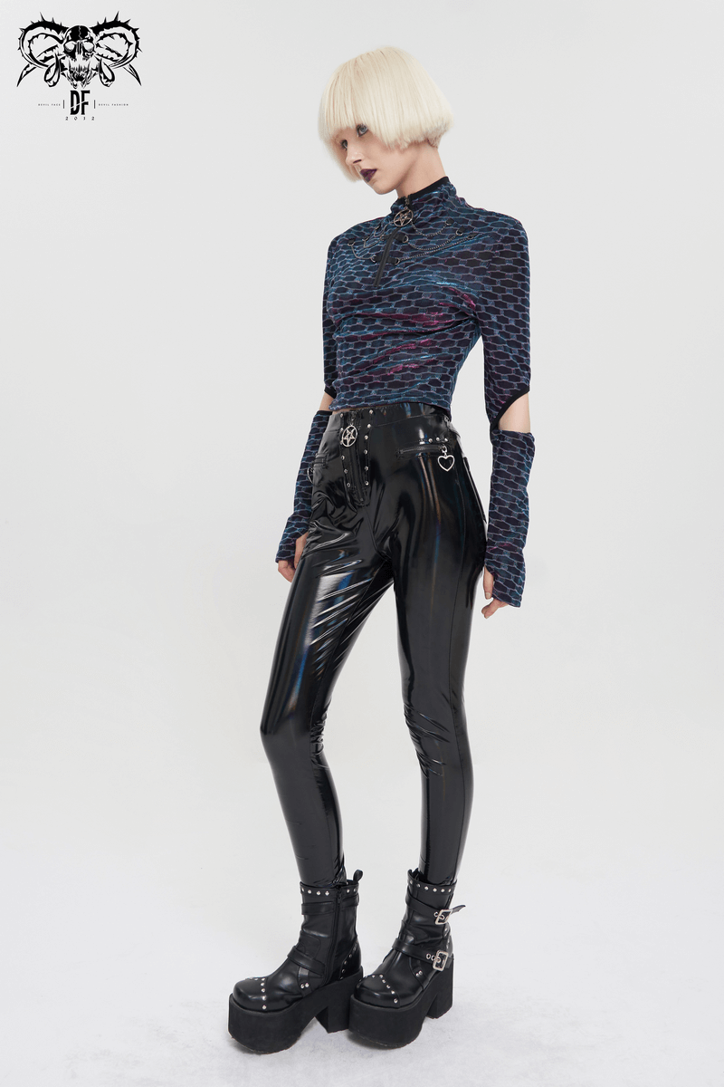 Punk female wearing a stylish long-sleeve top with elbow openings and shiny black pants, showcasing a modern edgy look.
