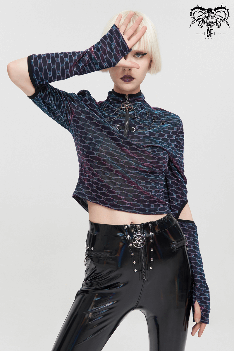 Punk female model in stylish short top with pentagram design and fitted sleeves.