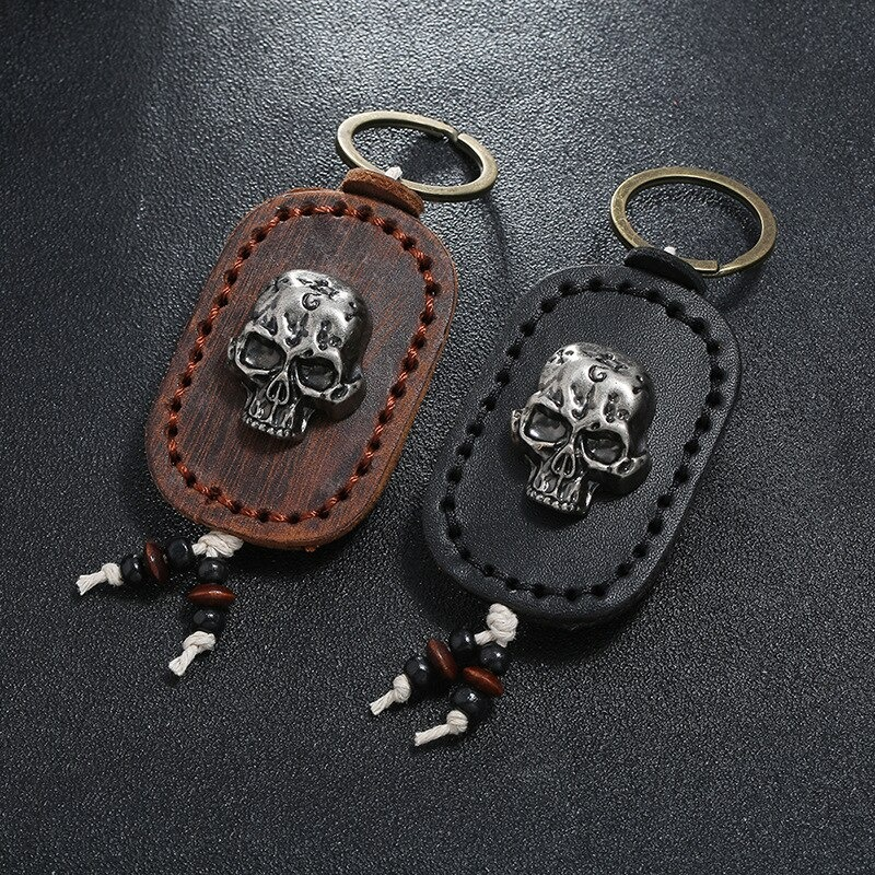 Punk leather keychain with skull in brown and black, stylish car accessory for men and women.