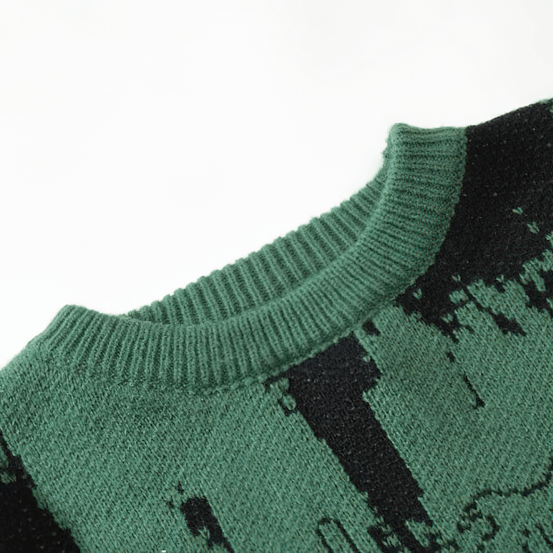 Close-up of a punk gothic knitted sweater neck with green and black patterns, showcasing grunge fashion style.