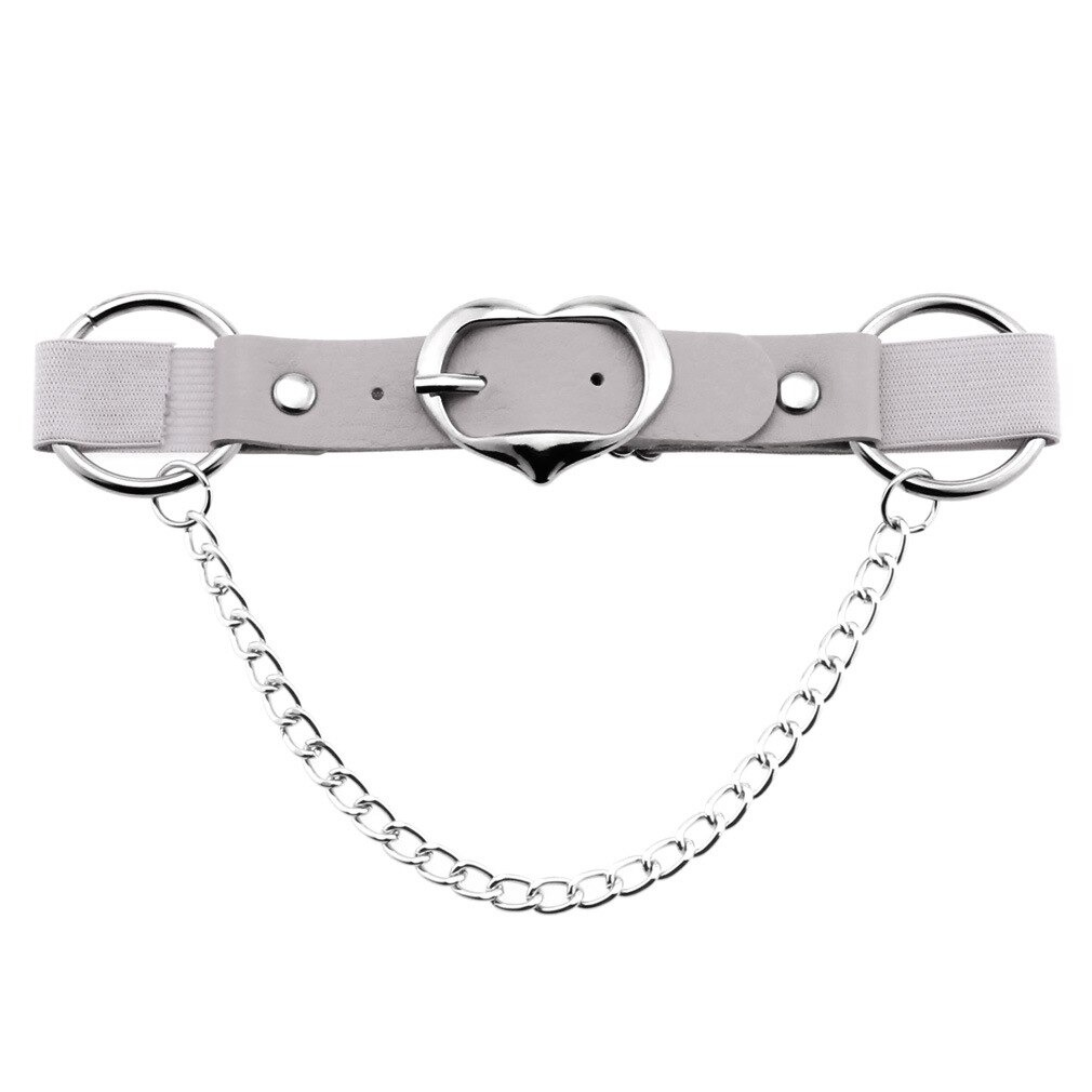 Punk heart leg strap belt made from PU leather featuring silver chain and heart buckle, perfect gothic accessory for women.