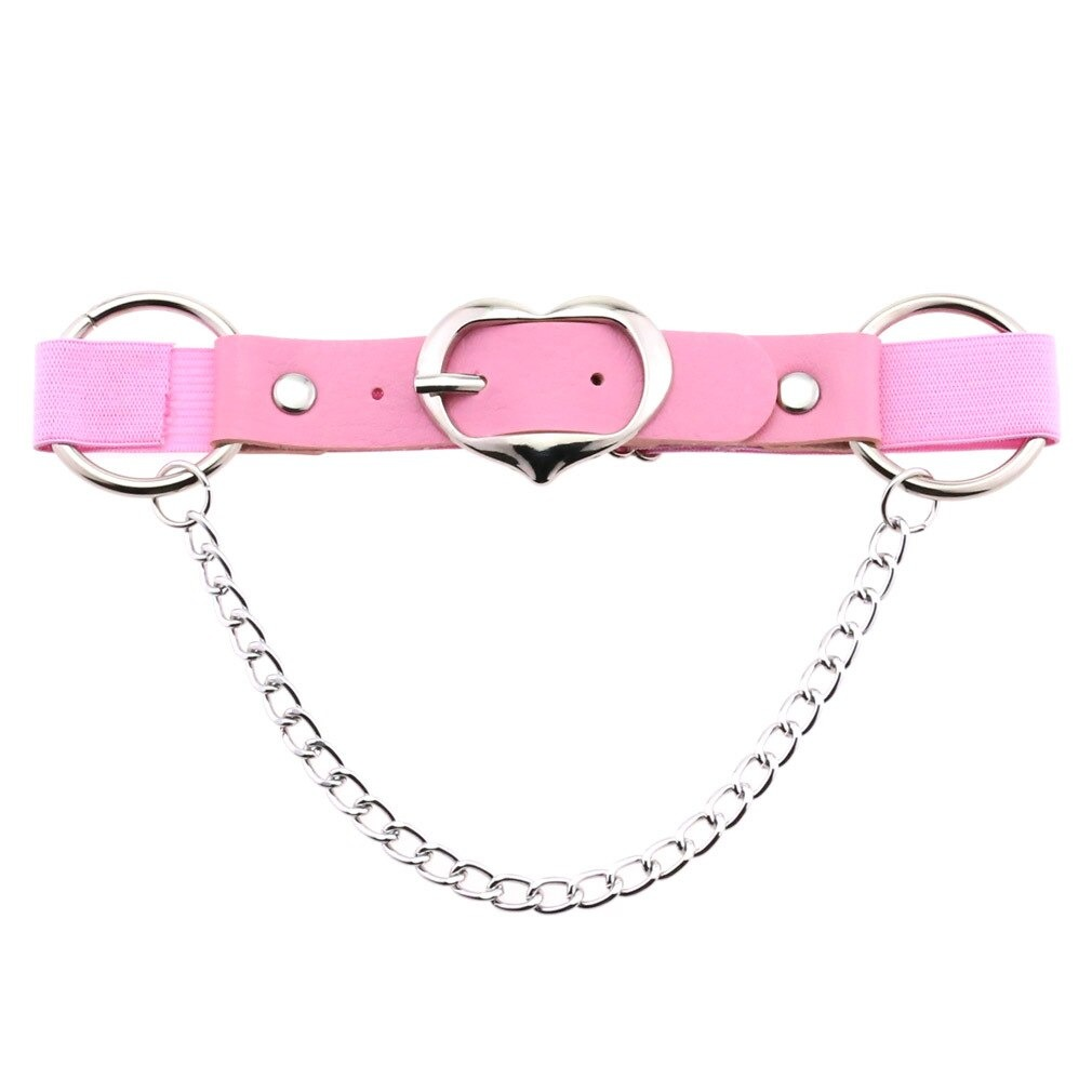 Stylish pink punk heart leg strap belt with chains, a gothic accessory for women, made of high-quality faux leather.