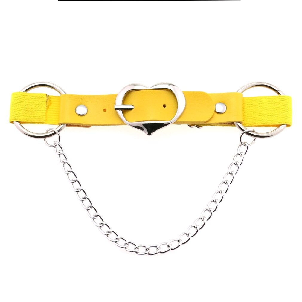 Punk heart leg strap belt in vibrant yellow, featuring silver fittings and a stylish chain, perfect gothic accessory for women.