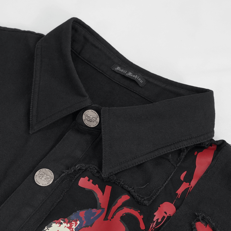 Close-up of a punk heart-printed ripped sleeveless black shirt with buttons, stylish and trendy for men.