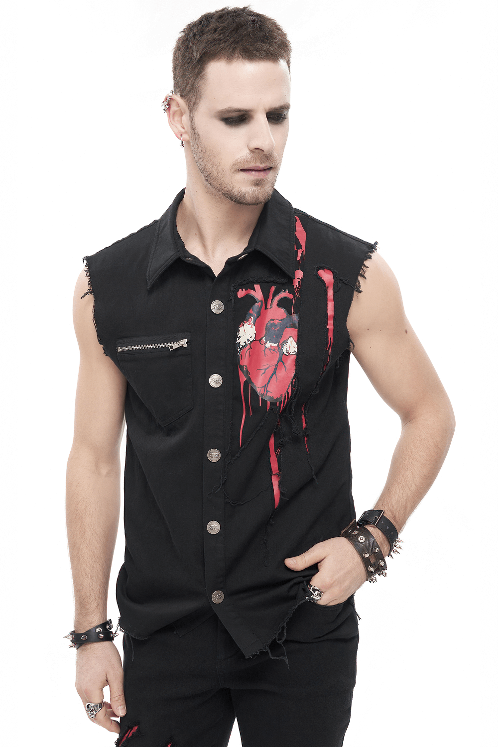 Stylish male model in a sleeveless punk black shirt featuring a heart print and ripped design, showcasing edgy fashion.