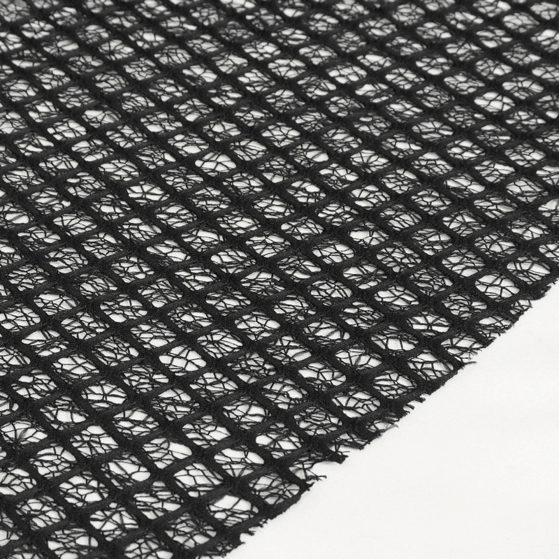 Close-up of punk irregular mesh fabric in black, showcasing unique texture for gothic clothing designs.