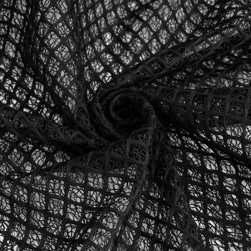 Close-up of black irregular mesh fabric, perfect for punk-style cloaks and gothic male clothing.