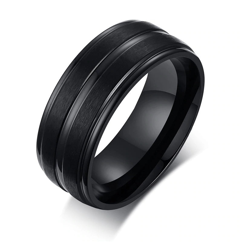 Black matte stainless steel ring with groove, perfect alternative jewelry for rave outfits and daily style.