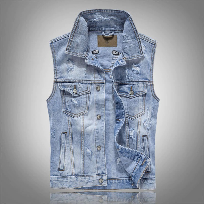 Punk men ripped denim vest in faded blue, with stylish patches and sleeveless design for edgy outfits.