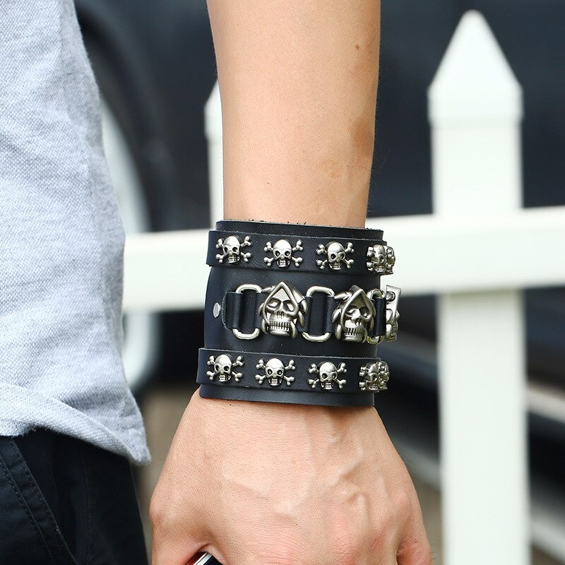 Punk men skull leather wide bracelet featuring silver skull charms, perfect for rock accessories and stylish outfits.