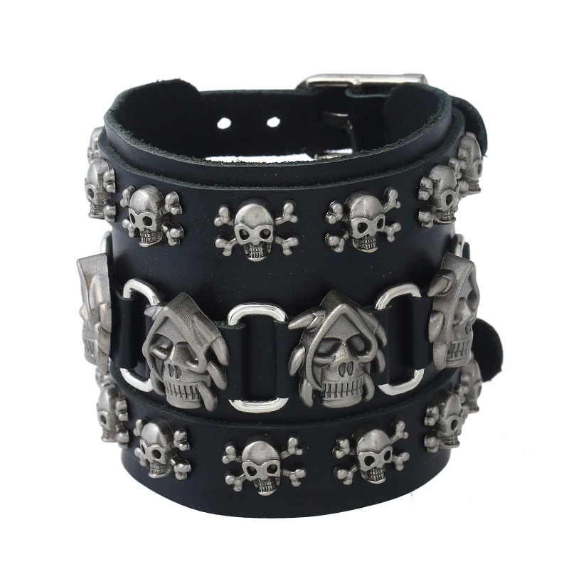 Punk men skull leather wide bracelet with silver skull charms and crossbones, perfect gothic rock accessory.