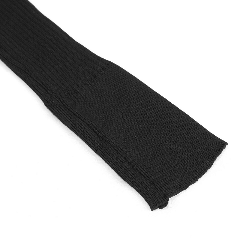 Close-up of the ribbed black fabric of a women's punk off-shoulder knitted top sleeve.