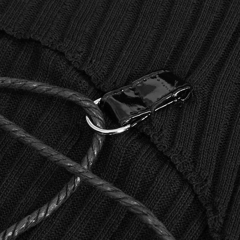 Close-up of a black knitted top's off-shoulder highlight and stylish hood with decorative cord detail.