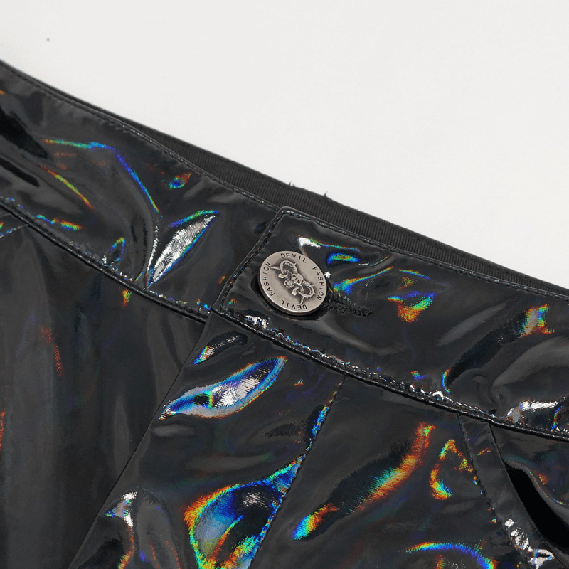 Close-up of black patent leather pants with chain detail and shiny finish, showcasing punk style and quality craftsmanship.