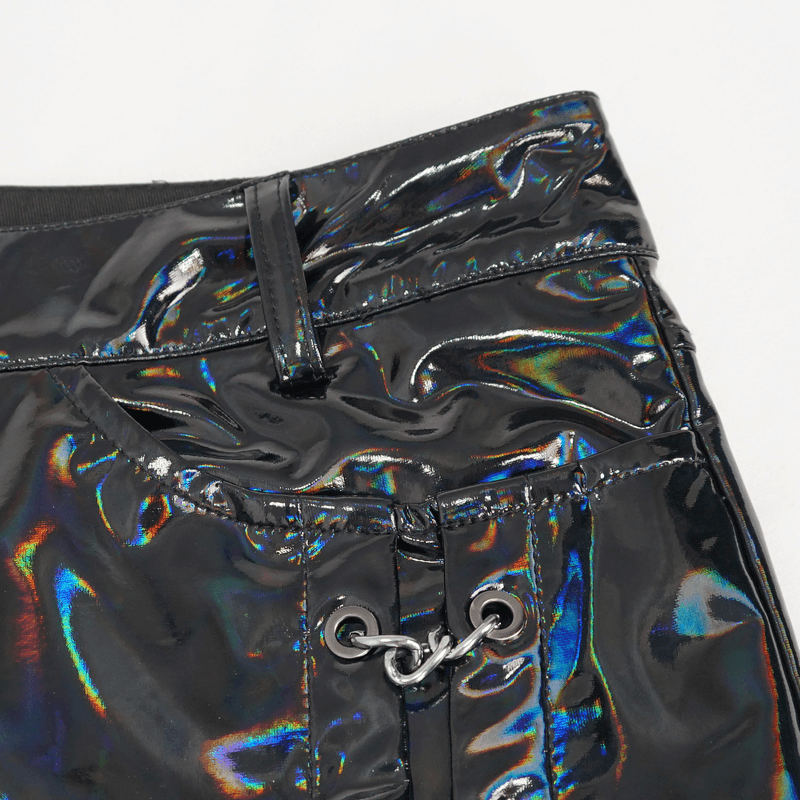 Close-up of black patent leather pants featuring shiny finish and stylish chain detail for men.