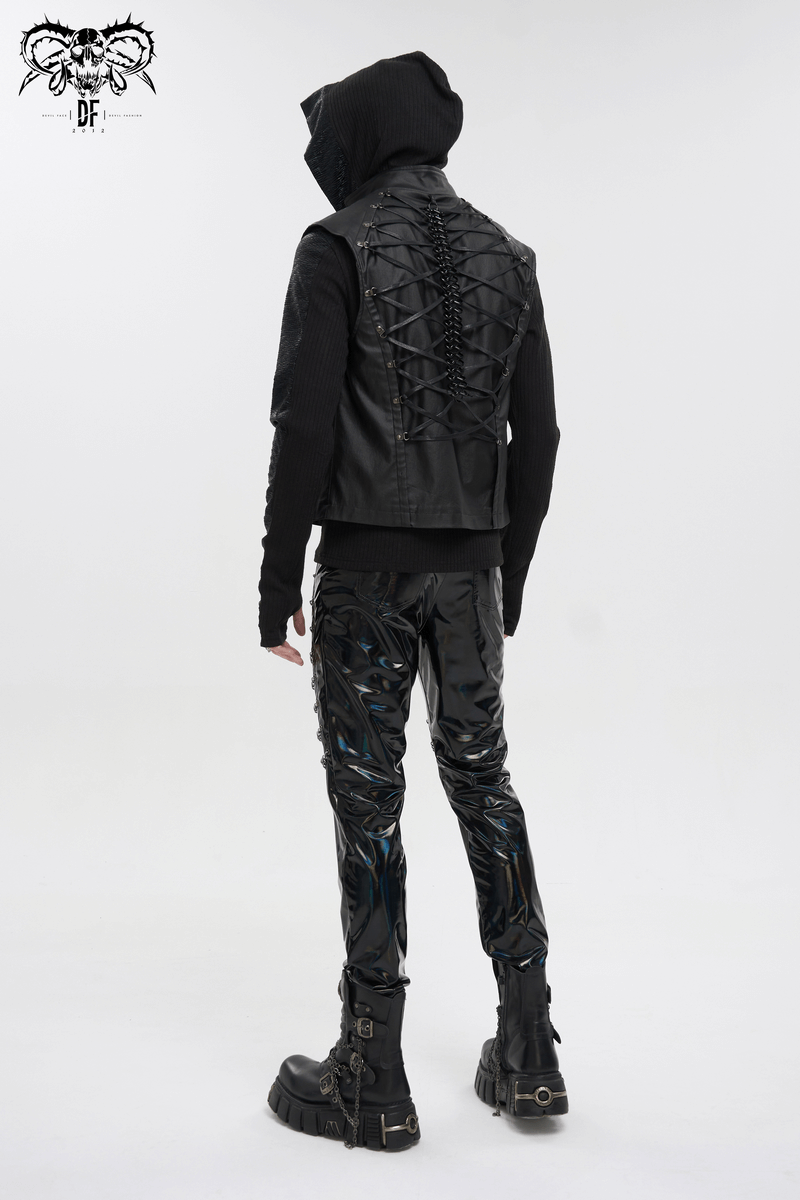 Fashionable model in black patent leather pants with chains, showcasing a punk gothic style and edgy look.
