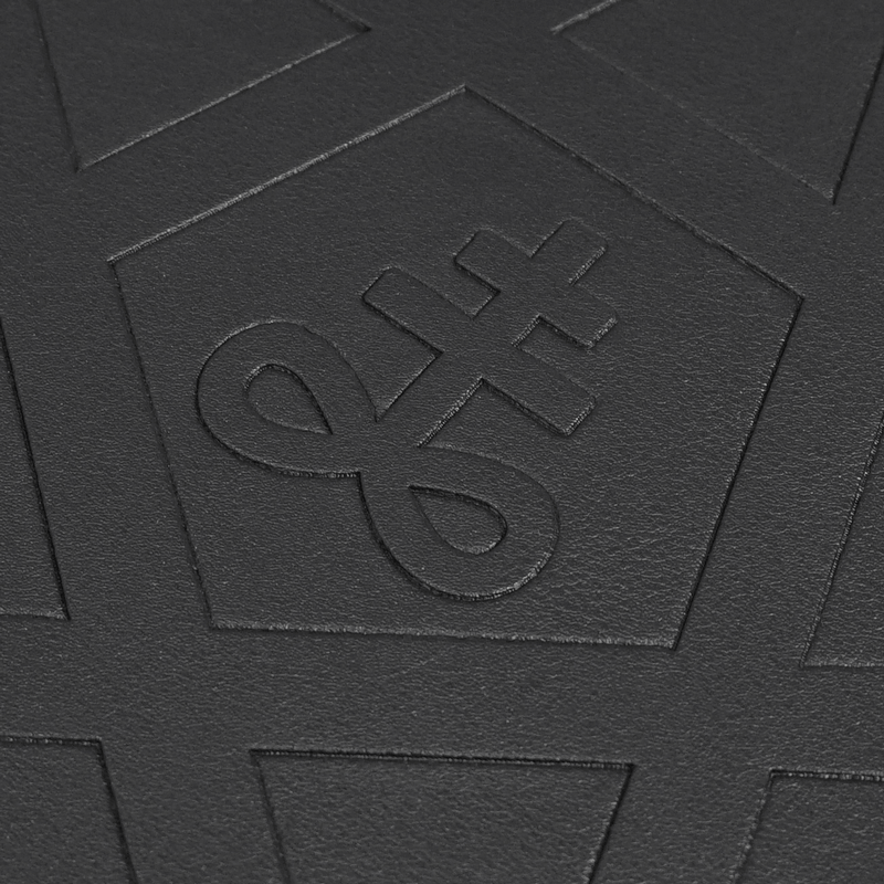 Gothic embossed design on black material featuring a pentagram and unique symbols for punk style.