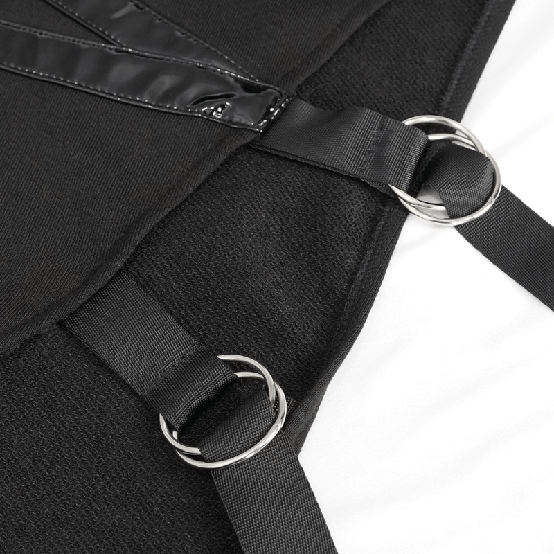Close-up of black straps and rings on a punk-style hooded top, showcasing its edgy design and asymmetric cut.