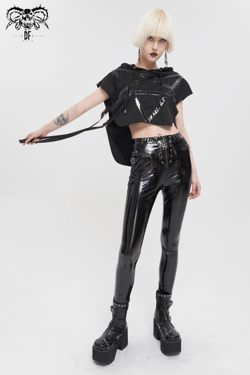 Punk pentagram hooded short top paired with shiny black latex pants and platform boots, showcasing edgy gothic fashion.