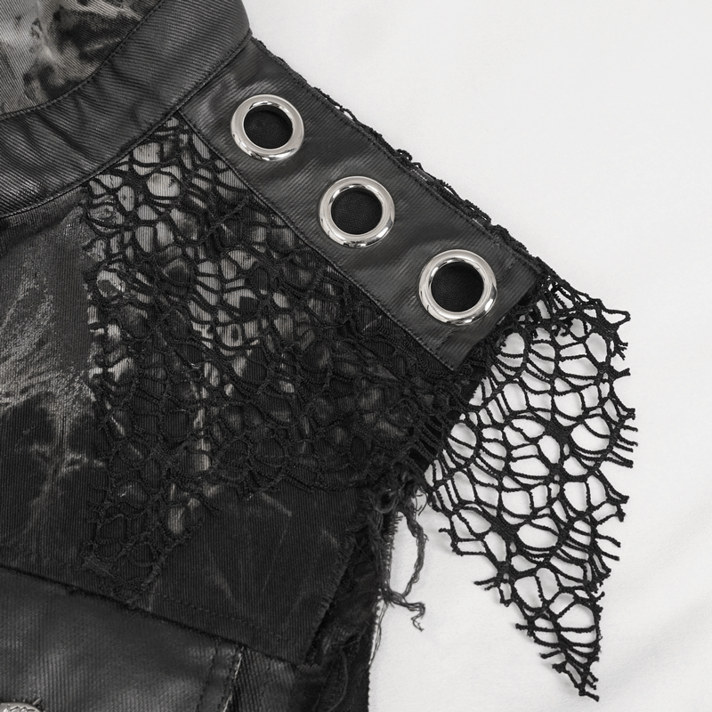 Close-up of gothic mesh lace and metal rivets on a punk rock distressed waistcoat vest.