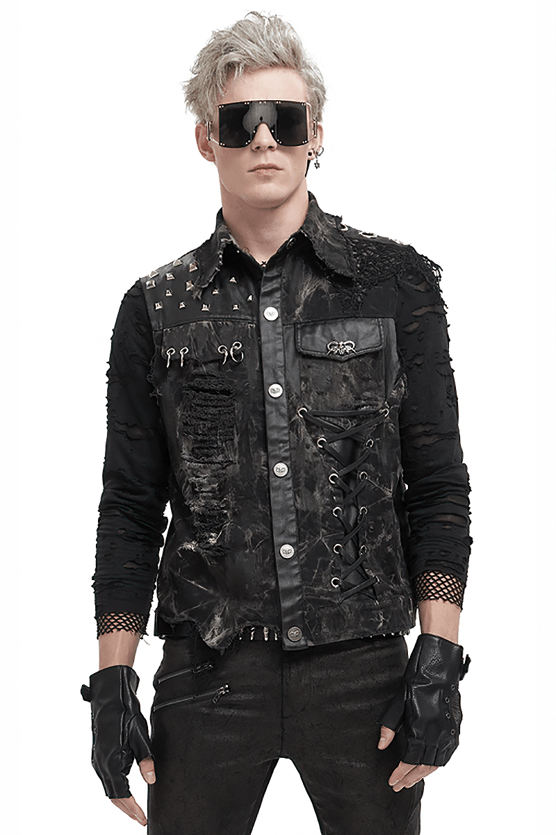 Punk rock style model in asymmetrical distressed waistcoat with gothic mesh rivets and pocket, showcasing edgy fashion.