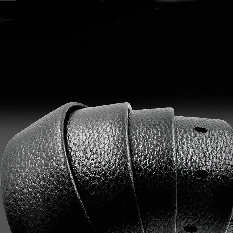 Close-up of a stylish black PU leather punk rock belt, showcasing its textured finish and smooth edges.