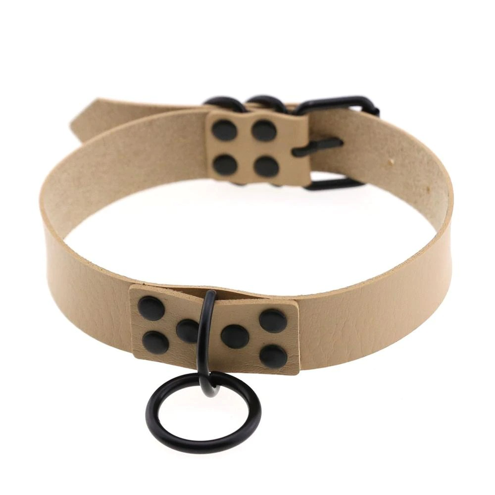 Punk rock Gothic choker necklace in beige PU leather with black metal studs and ring detail.