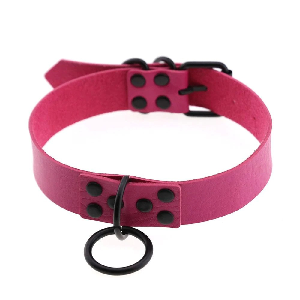 Punk rock gothic choker necklace in bright pink PU leather with black studs and ring detail, perfect for edgy fashion outfits.