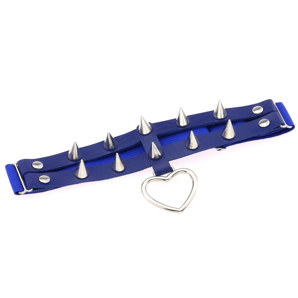 Blue punk rock leg garter with silver spikes and heart pendant, a stylish accessory for women's goth fashion.