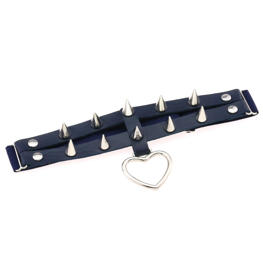 Punk rock heart leg garter with silver spikes, stylish PU leather thigh harness for edgy women's fashion.