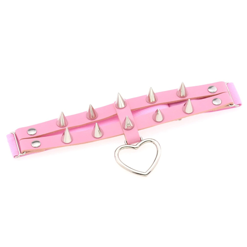 Pink punk rock leg garter with silver spikes and heart pendant, perfect for women's gothic fashion.