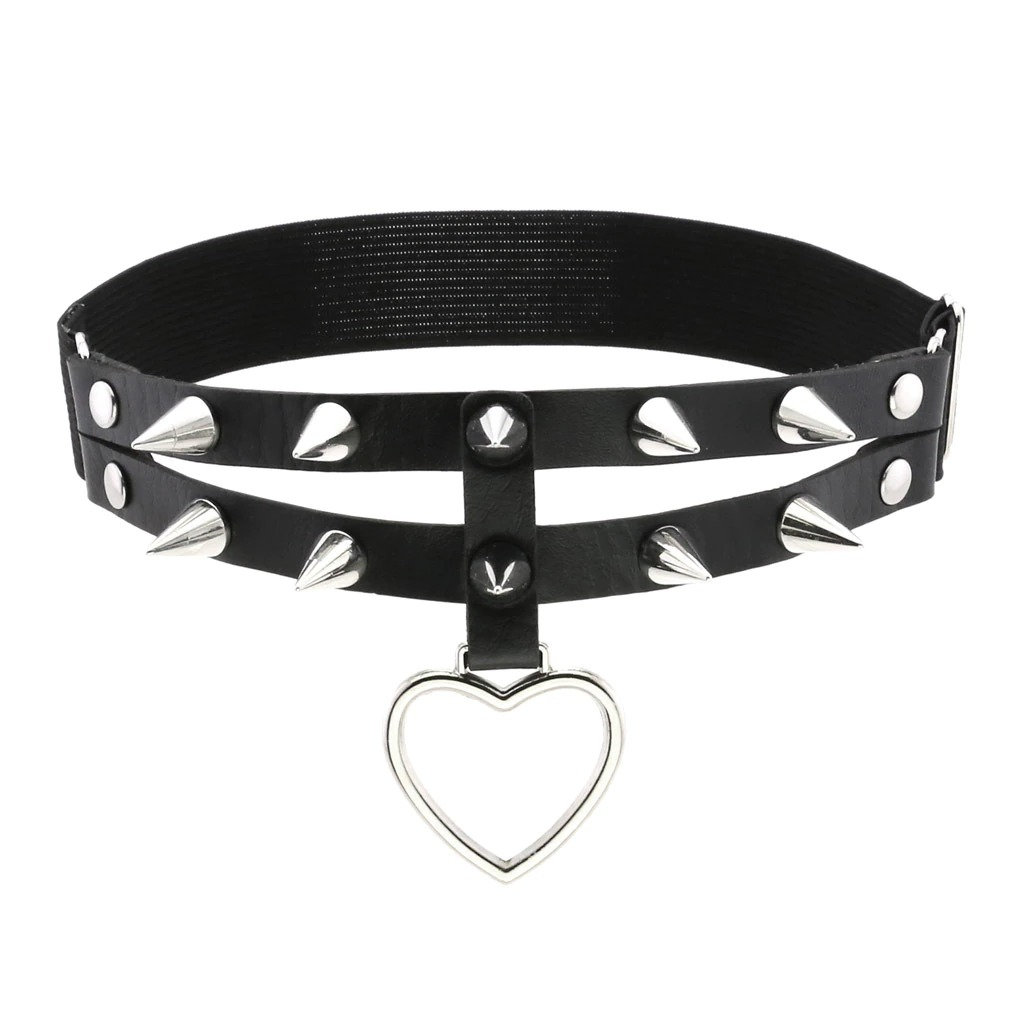 Punk rock leg garter made from PU leather, featuring silver spikes and a heart pendant, stylish goth accessory for women.