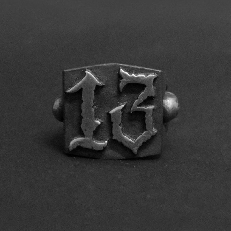 Stylish retro gothic ring featuring the number 13, designed for punk rock fashion lovers.