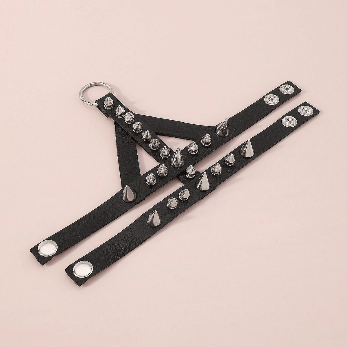 Punk rock style leather bracelet with spikes and studs, perfect for edgy women's fashion accessories.