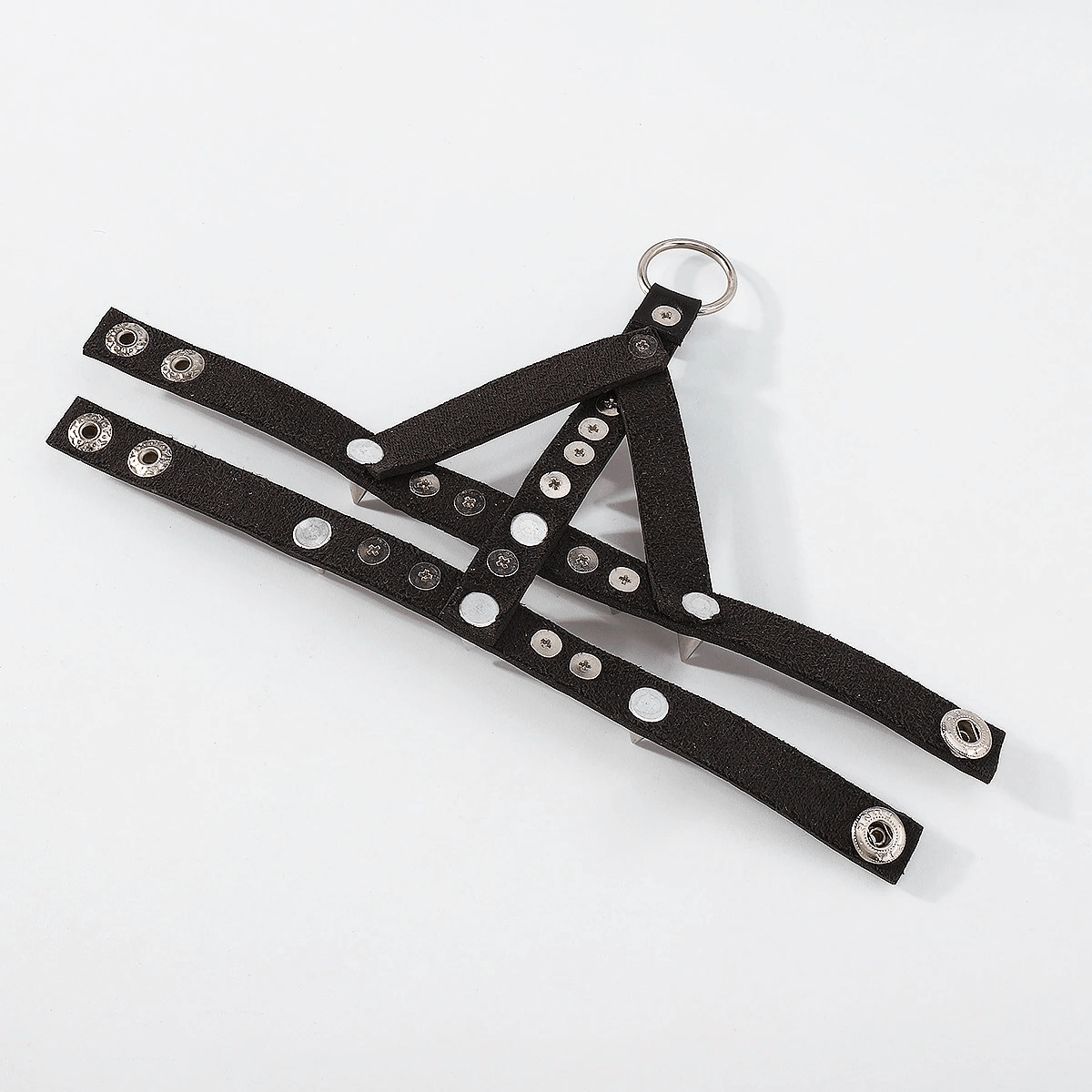 Punk rock style black leather harness with metal studs and ring detail, perfect for edgy fashion lovers.