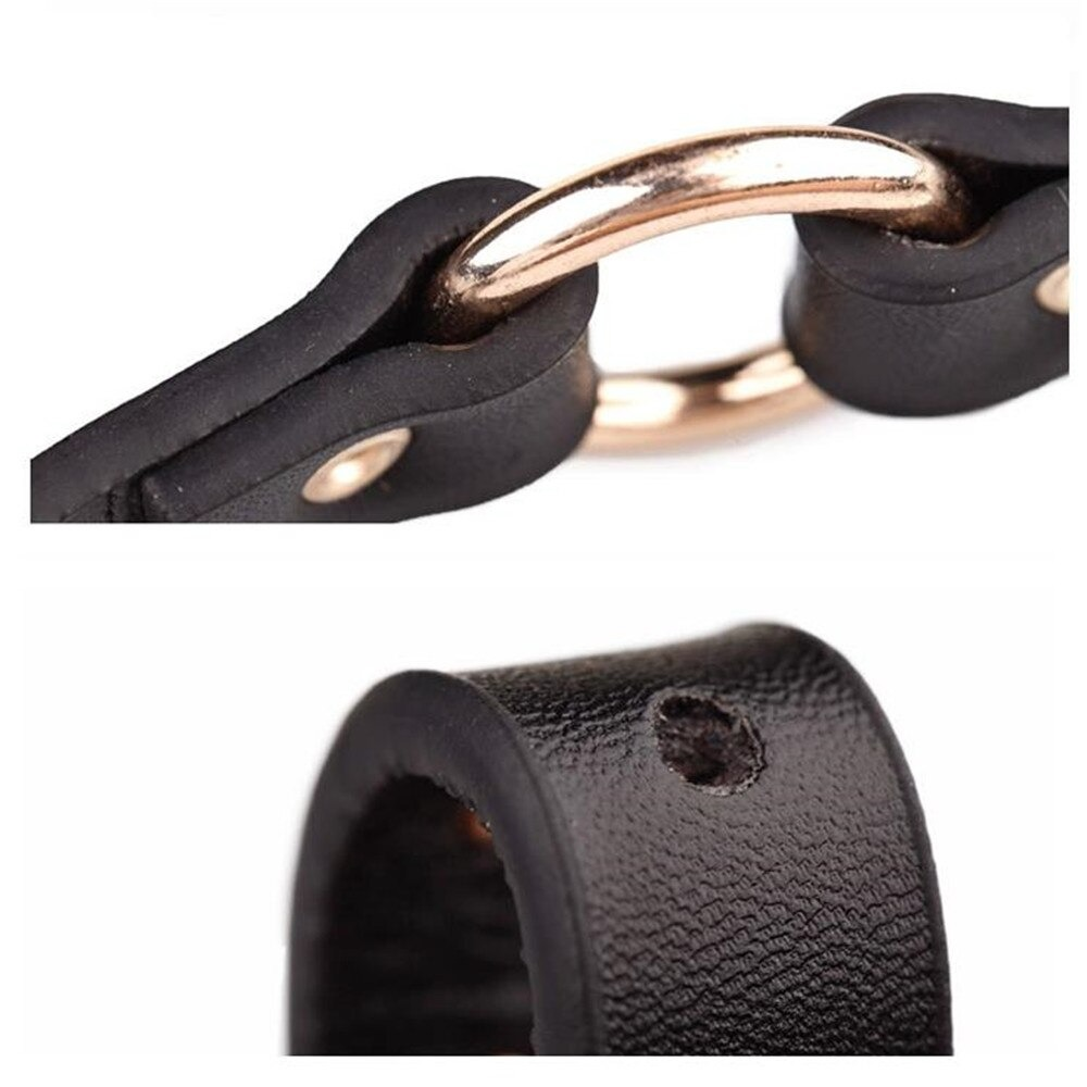 Close-up of a black punk rock belt showing gold rivet details and quality PU leather construction.