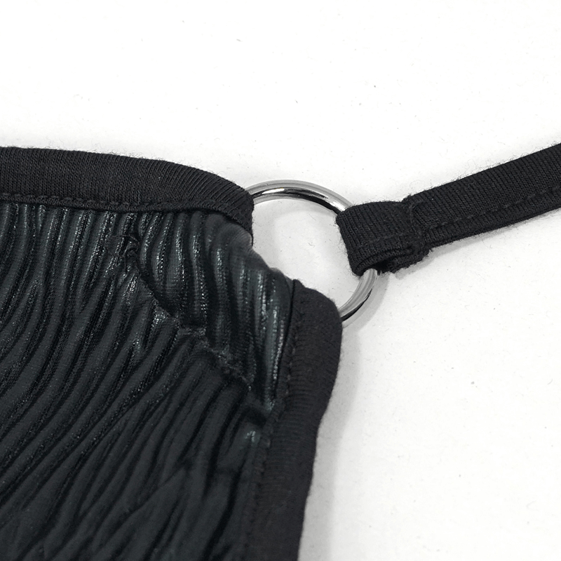 Close-up of black swimsuit drawstring detail featuring sleek metallic ring for punk rock style.