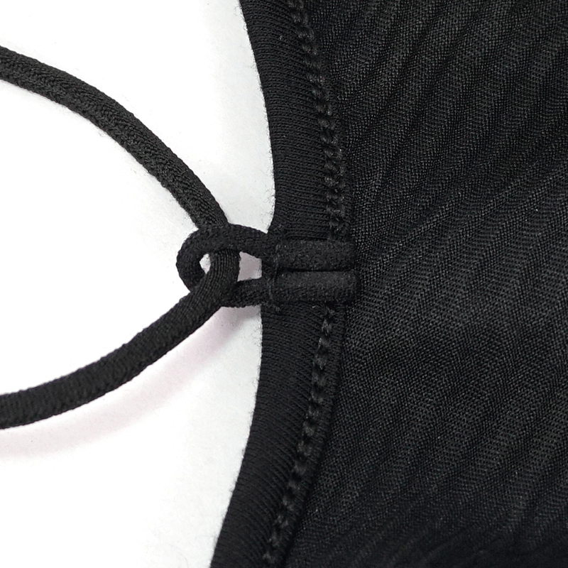 Close-up of the drawstring detail on a stylish black punk rock women's swimsuit.