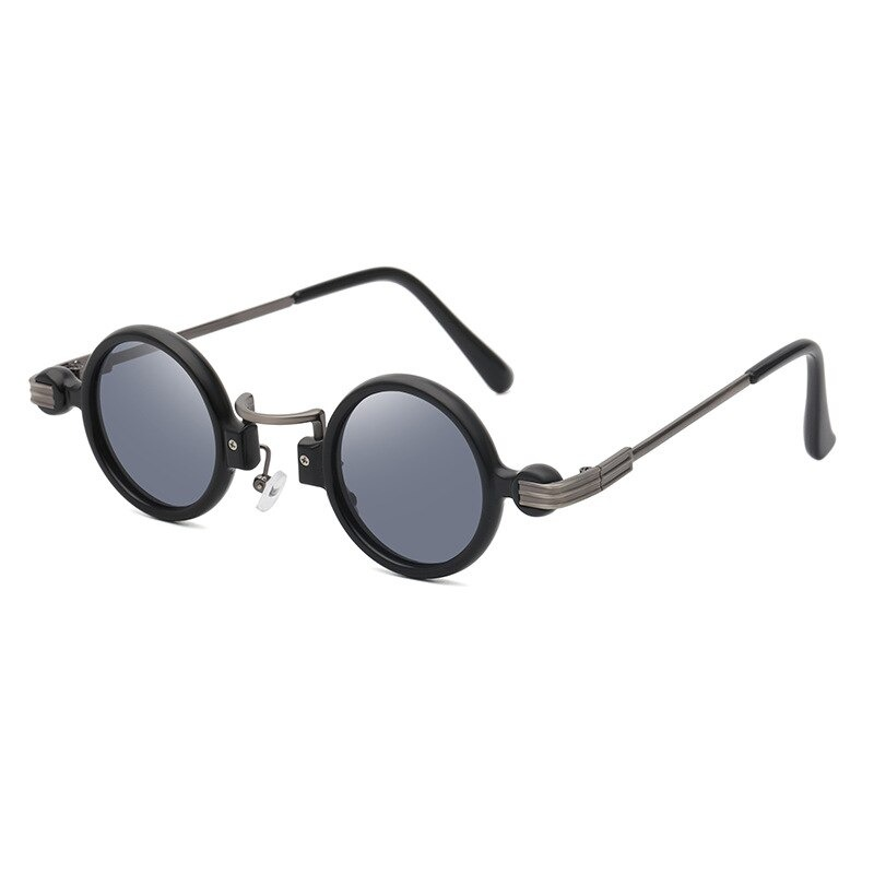 Punk round sunglasses for men and women, stylish vintage shades with dark lenses and unique frame design.