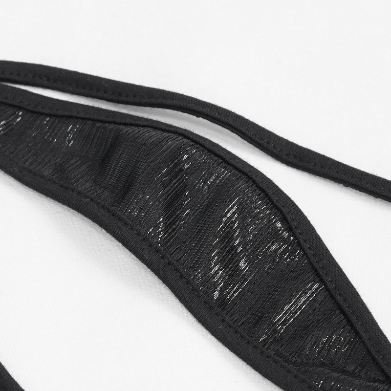 Close-up of punk sexy body harness lingerie set featuring soft black fabric and stylish straps.