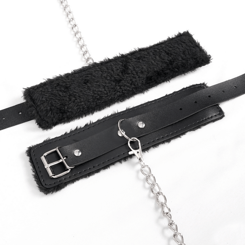 Black punk-style body harness straps with metal chain and faux fur accents for edgy lingerie look.