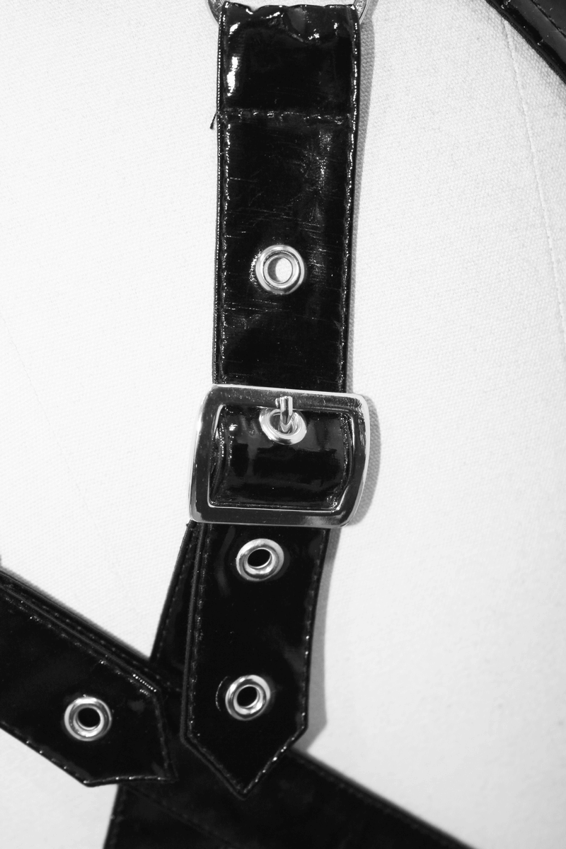 Close-up of black PU leather harness strap with silver fittings, showcasing punk style details.