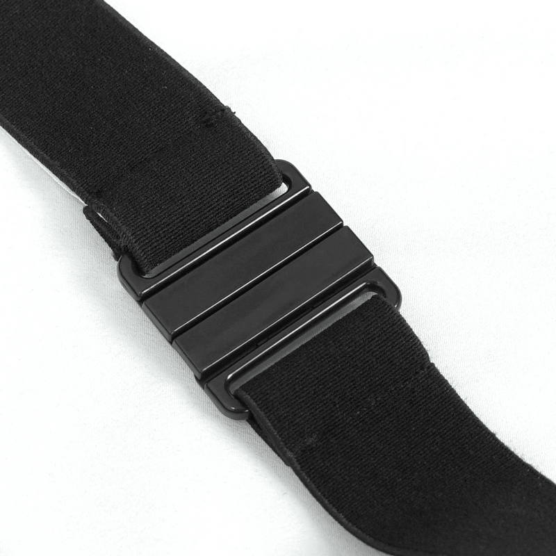 Close-up of a black belt buckle with elastic strap, perfect for securing punk style bodysuits.