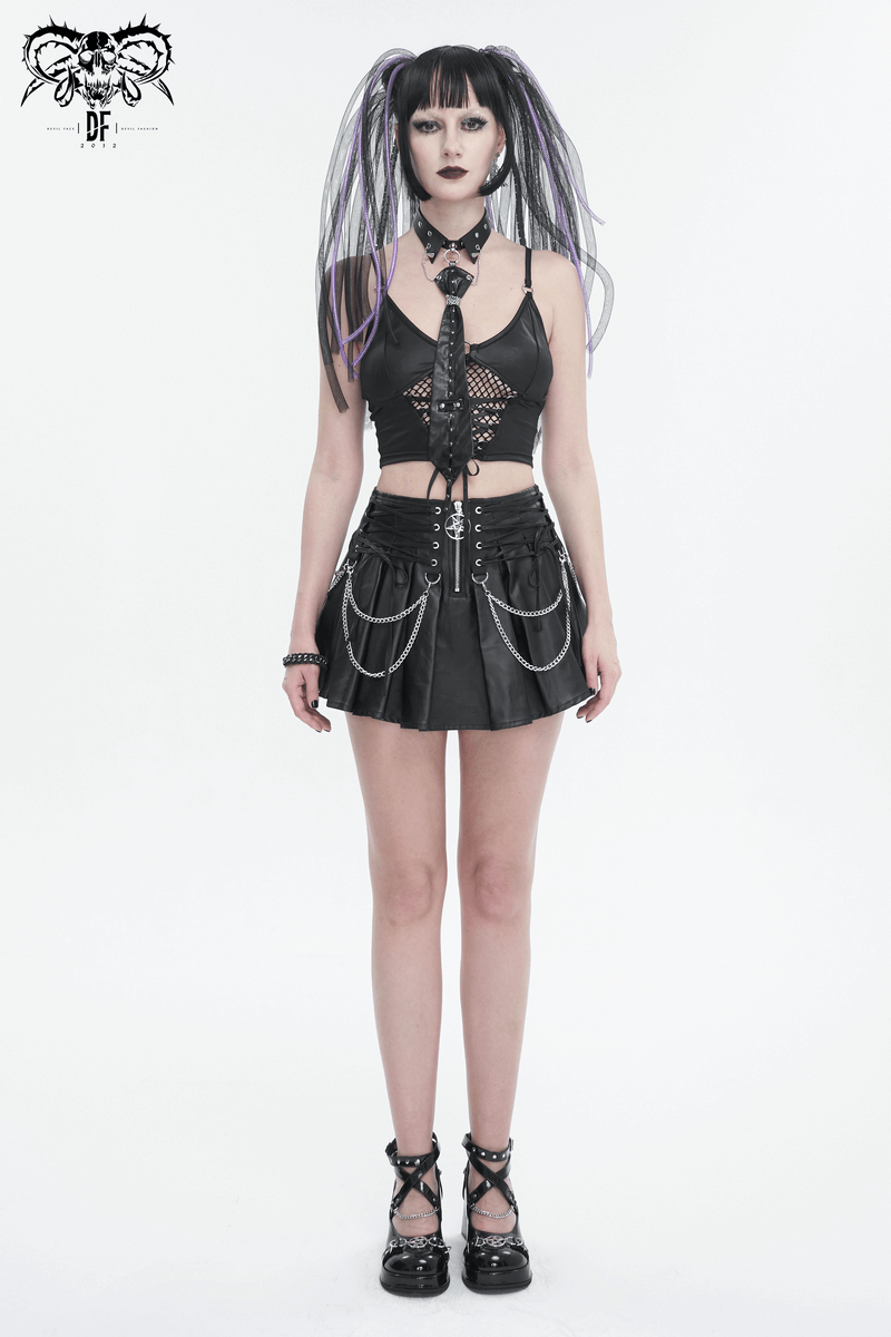 Model showcasing a punk outfit featuring a black pleated skirt with chains and edgy accessories.