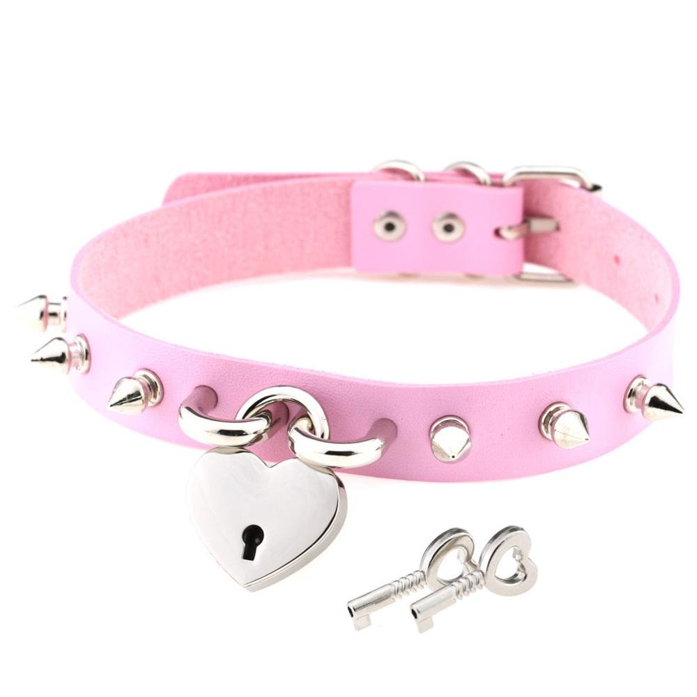 Punk spike choker necklace in pink PU leather with heart lock and silver details, perfect for gothic or trendy outfits.