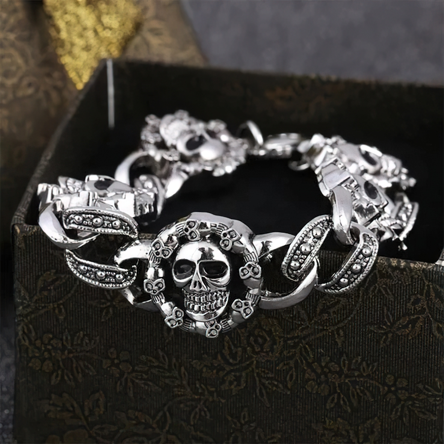Punk stainless steel bracelet with gothic skull heads, perfect for edgy men's fashion and jewelry.