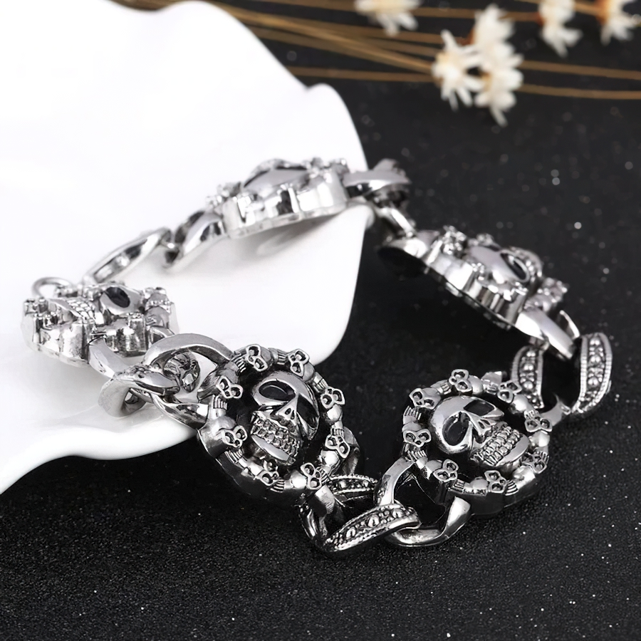 Punk stainless steel bracelet for men featuring gothic skull heads, perfect for enhancing your edgy style.