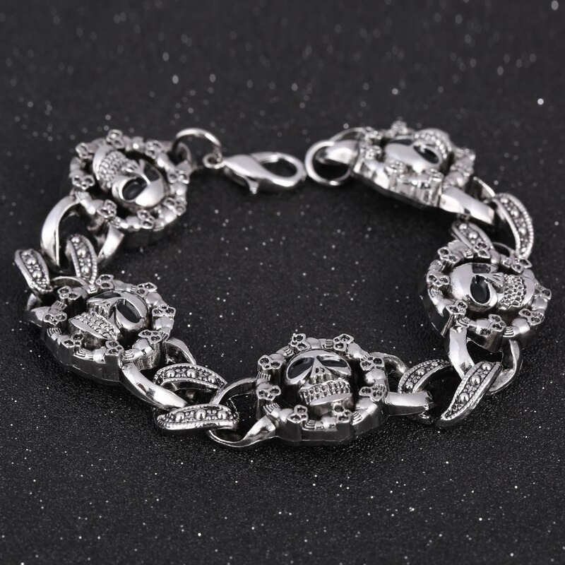 Men's punk stainless steel bracelet featuring gothic double skull heads, perfect for edgy fashion statements.
