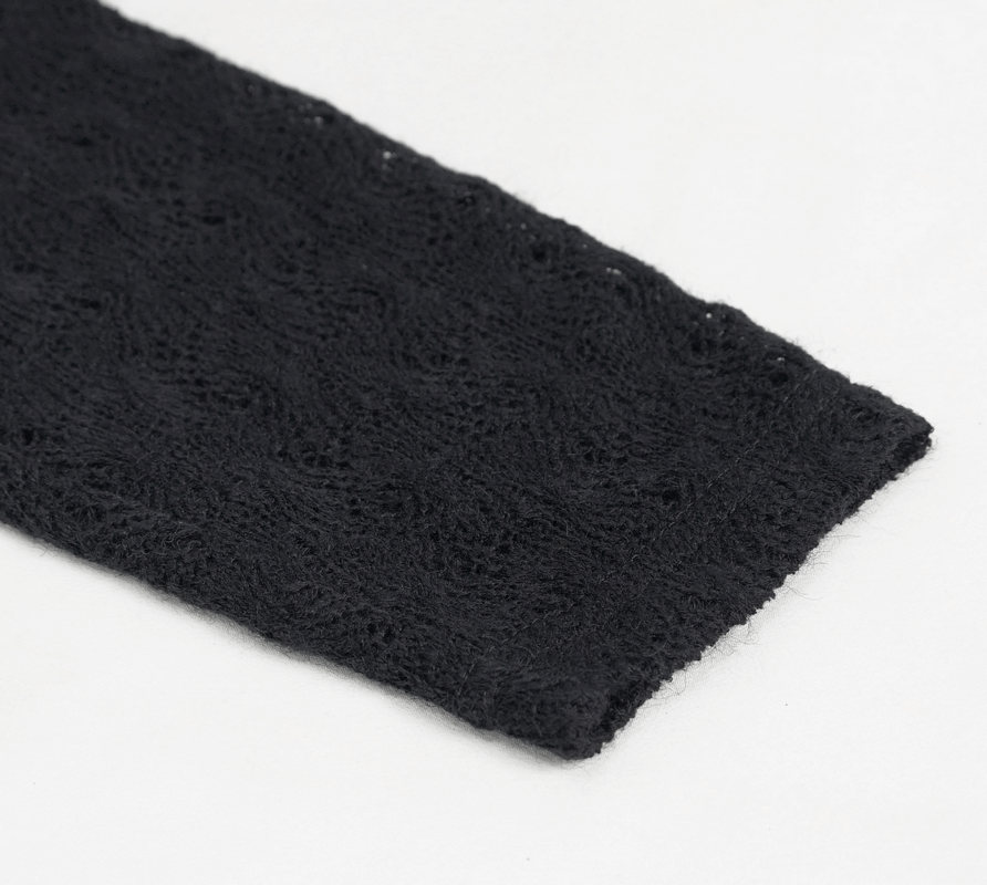 Close-up of black lace fabric showcasing elegant textured pattern for alternative fashion.