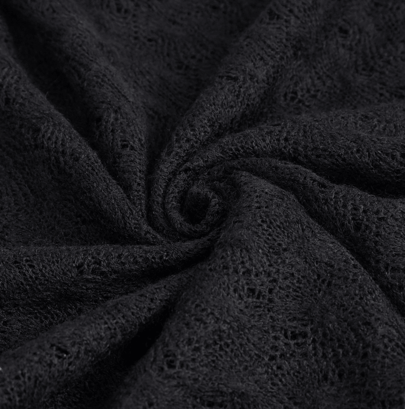 Close-up of black textured fabric showcasing punk style, perfect for alternative clothing designs.